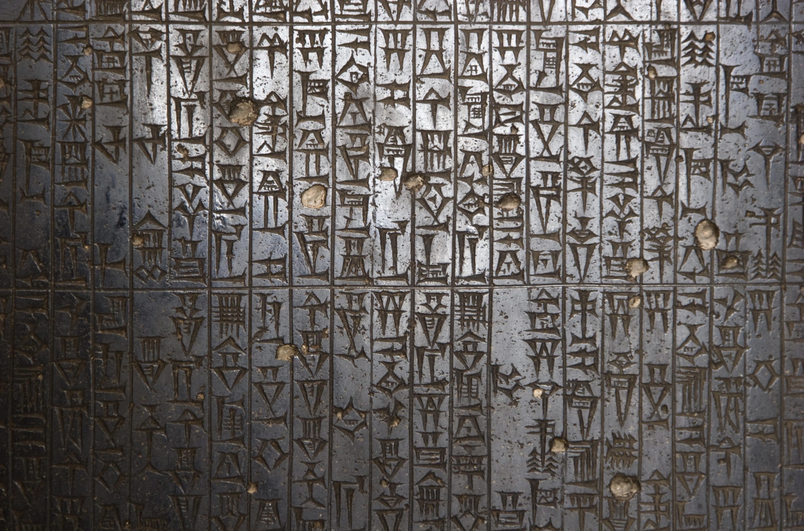 Black stone stele containing the Hammurabi code of laws.